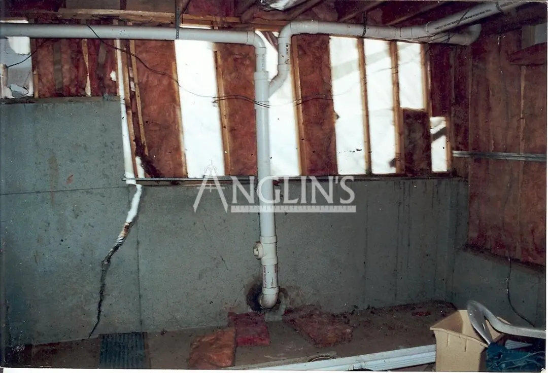 a week basement wall with visible isolation before anglin took care of it
