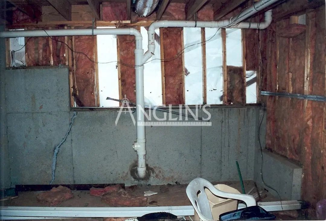 a week basement wall with visible isolation before anglin took care of it