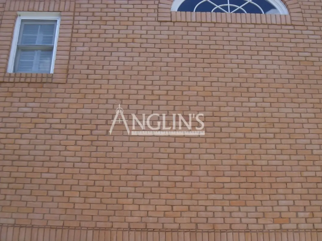 brick wall after masonry repair done by anglin's team