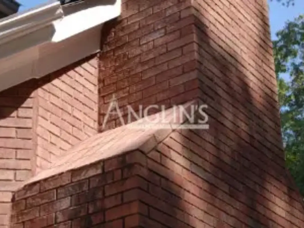 Leaning Chimney Settling - After